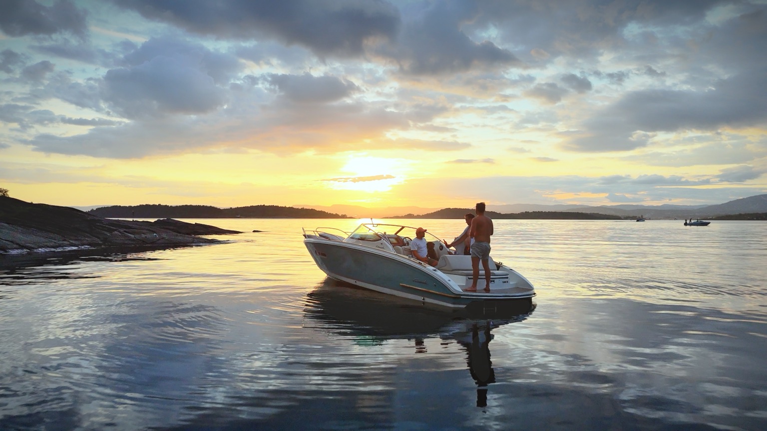 Anchored in a sheltered cove near the Oslofjord islands at sunset