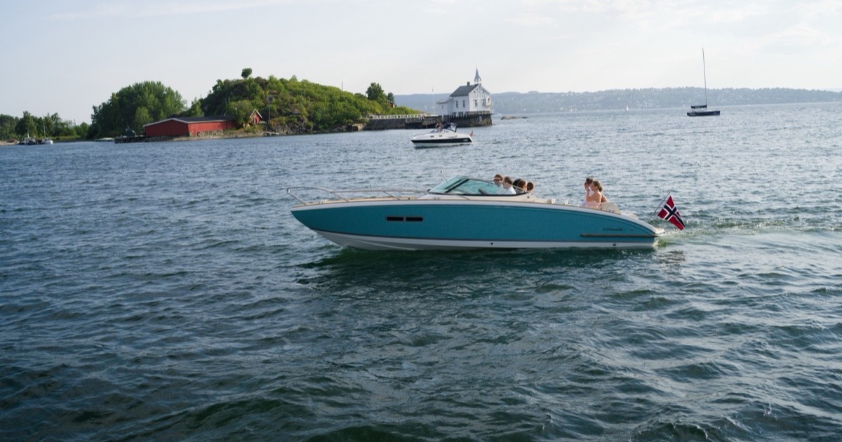 A quiet turquoise cove between islands in the inner Oslofjord, reachable only by boat
