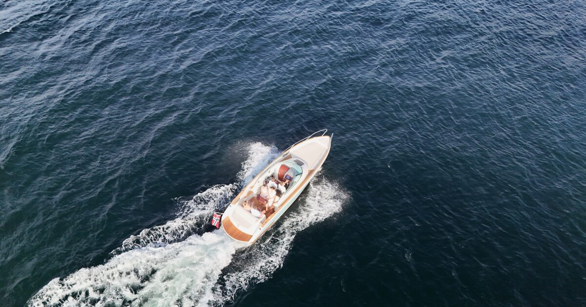 Deep, dark fjord water seen straight from above
