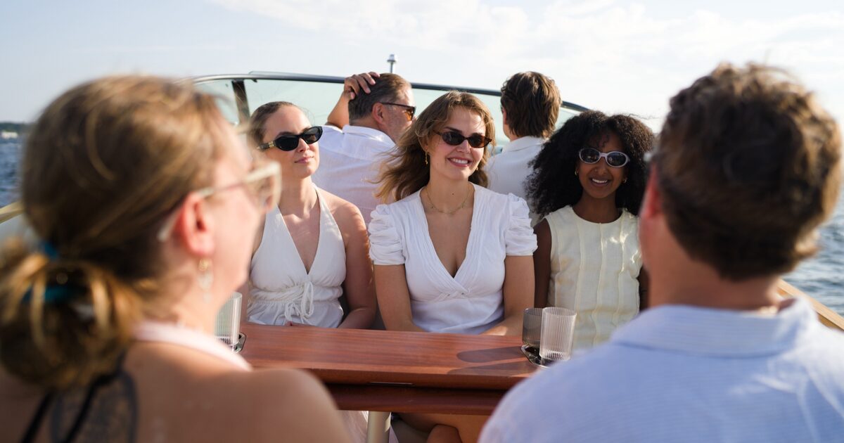 A small private group around the table on board